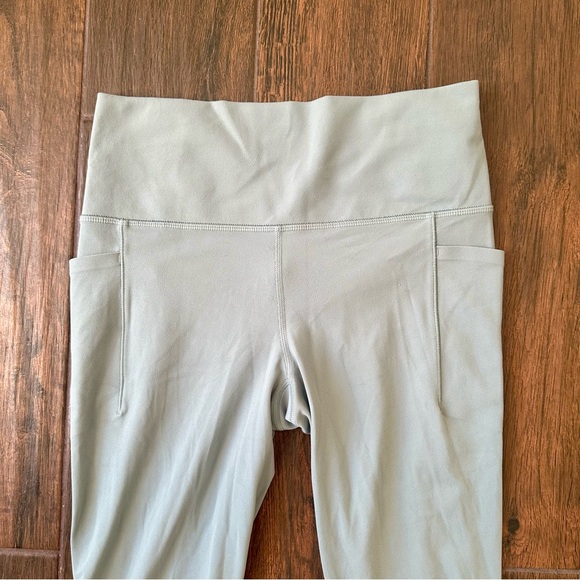 Athleta Salutation Stash Pocket 7/8 Legging Size Medium - Picture 2 of 7